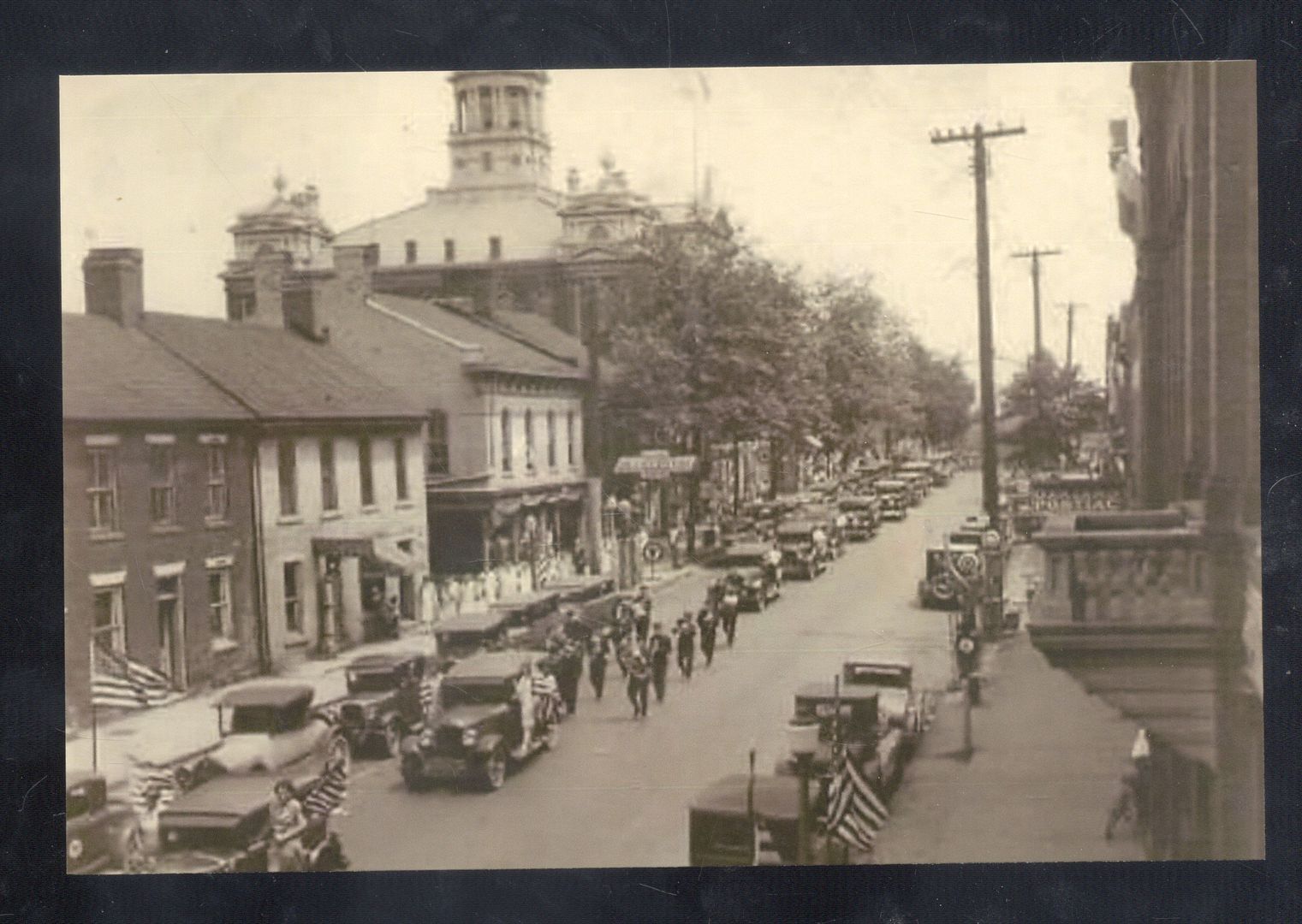 REAL PHOTO ST. CLAIRSVILLE OHIO DOWNTOWN STREET SCENE PARADE POSTCARD COPY