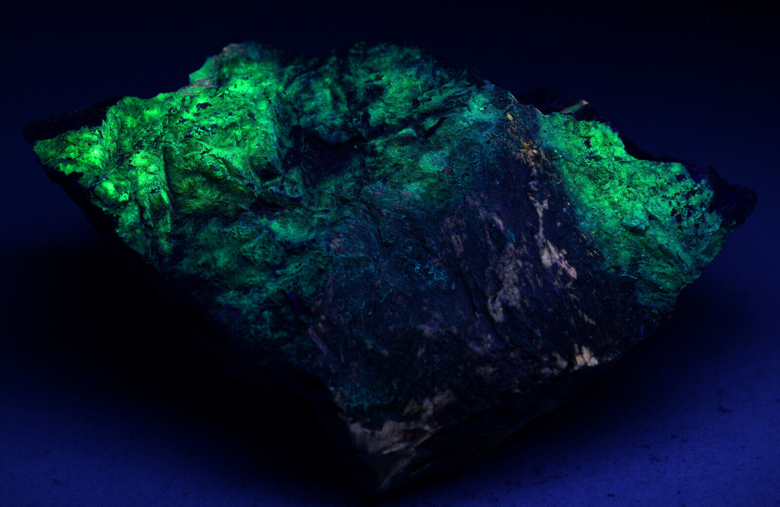 Wollastonite, Garnet, Diopside rock, fluorescent. Sweden. 734 grams.