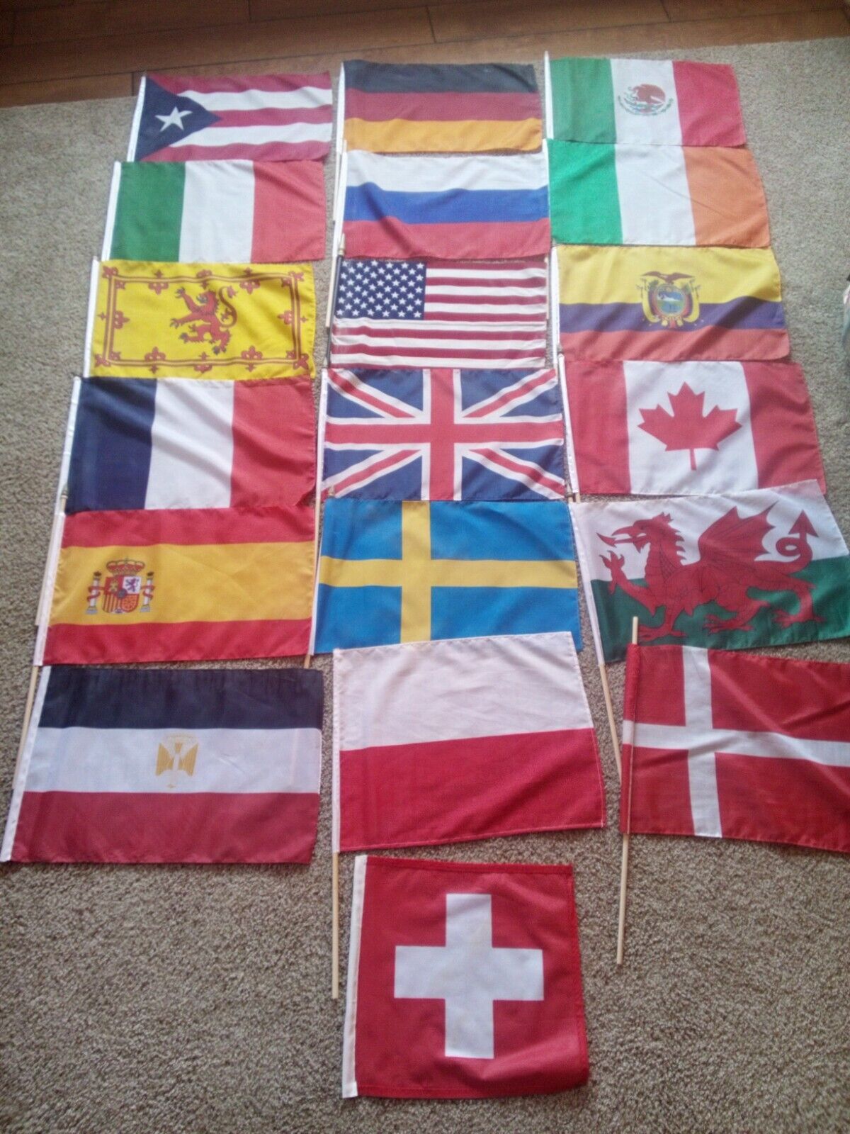 Lot of 19 world flags. 17x12 Most with poles. Fun With Flags.