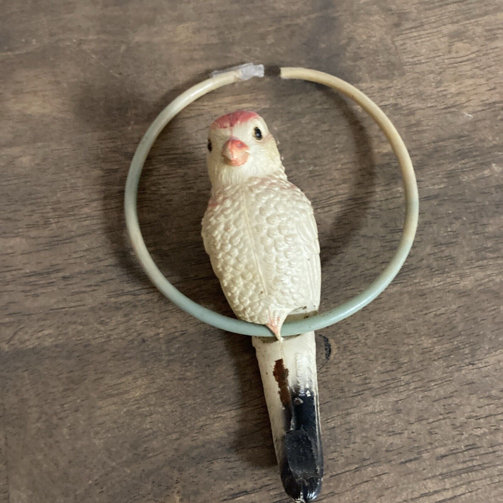 Vintage Celluloid Bird On Ring Perched 