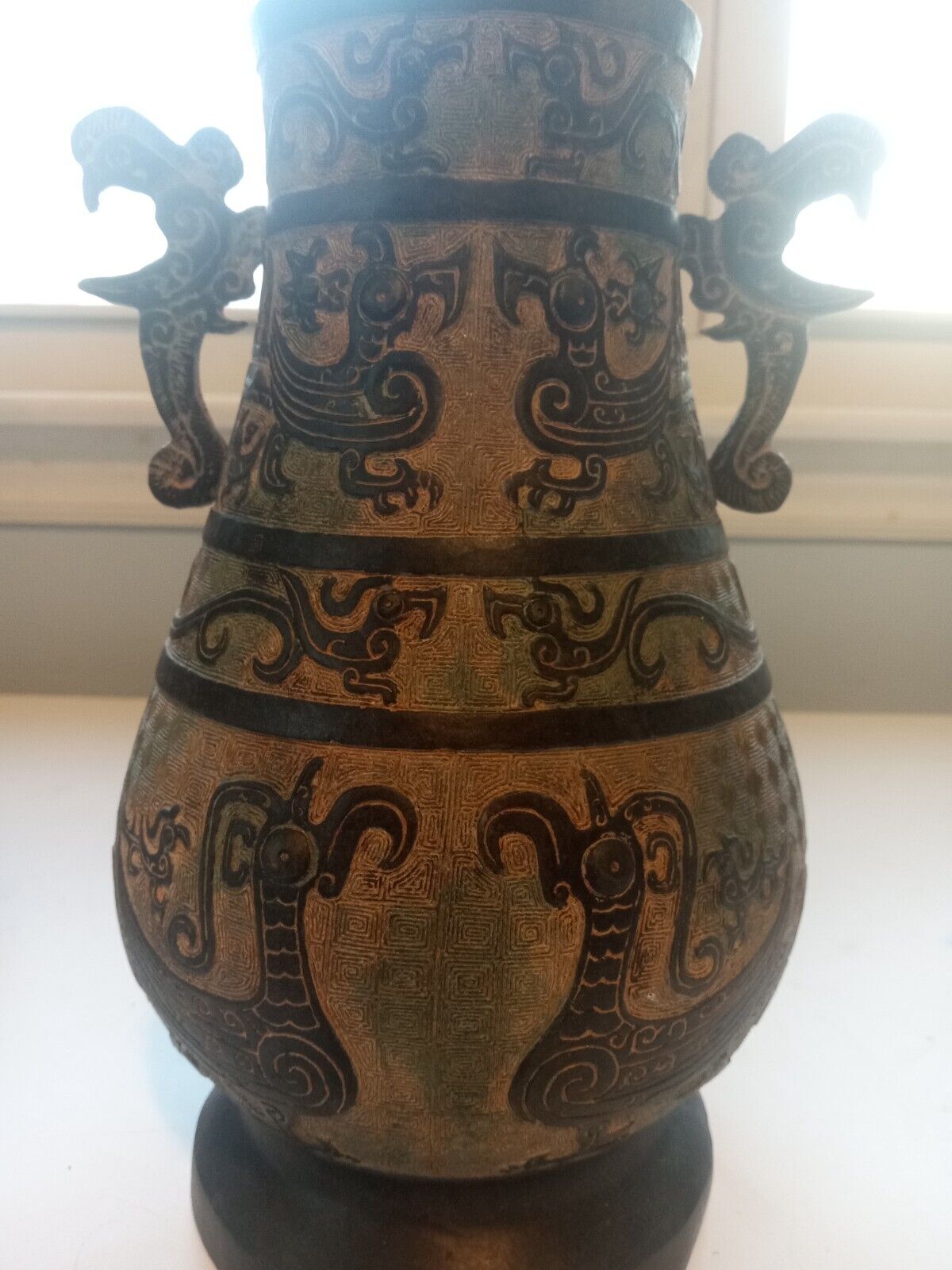 Antique bronze vase with dragons