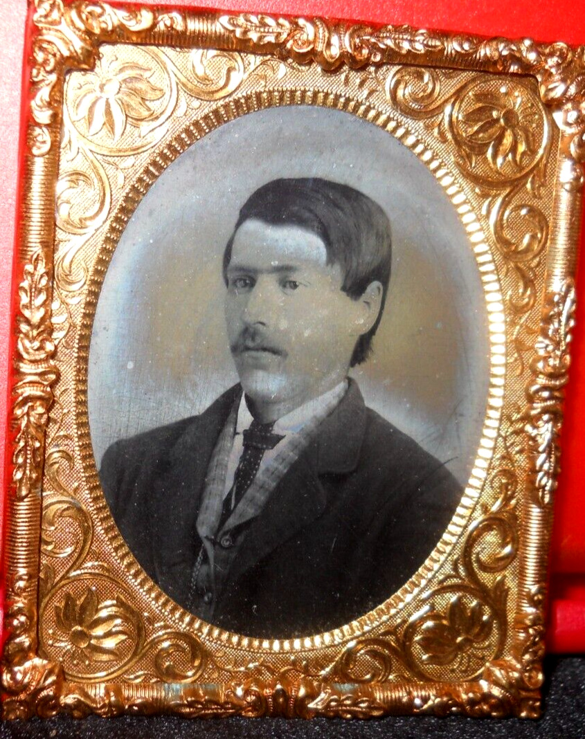1/9th Size Tintype of young man in brass mat/frame