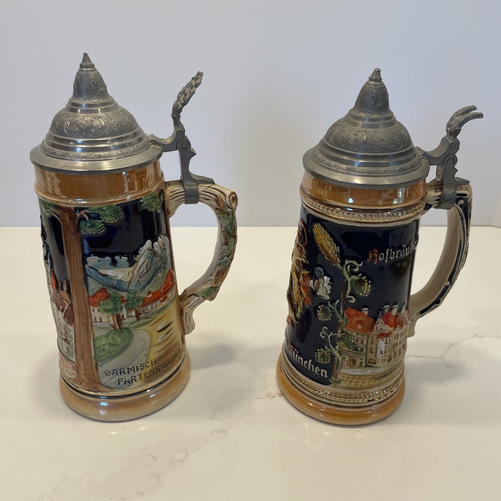 Pair of .5L German Steins with pewter lids- Made in Germany 9.5\
