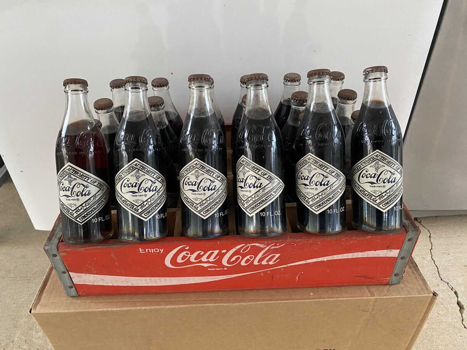 75th Anniversary, Atlanta, Coca Cola Bottling Company (Lot Of 24 Bottles & Crate