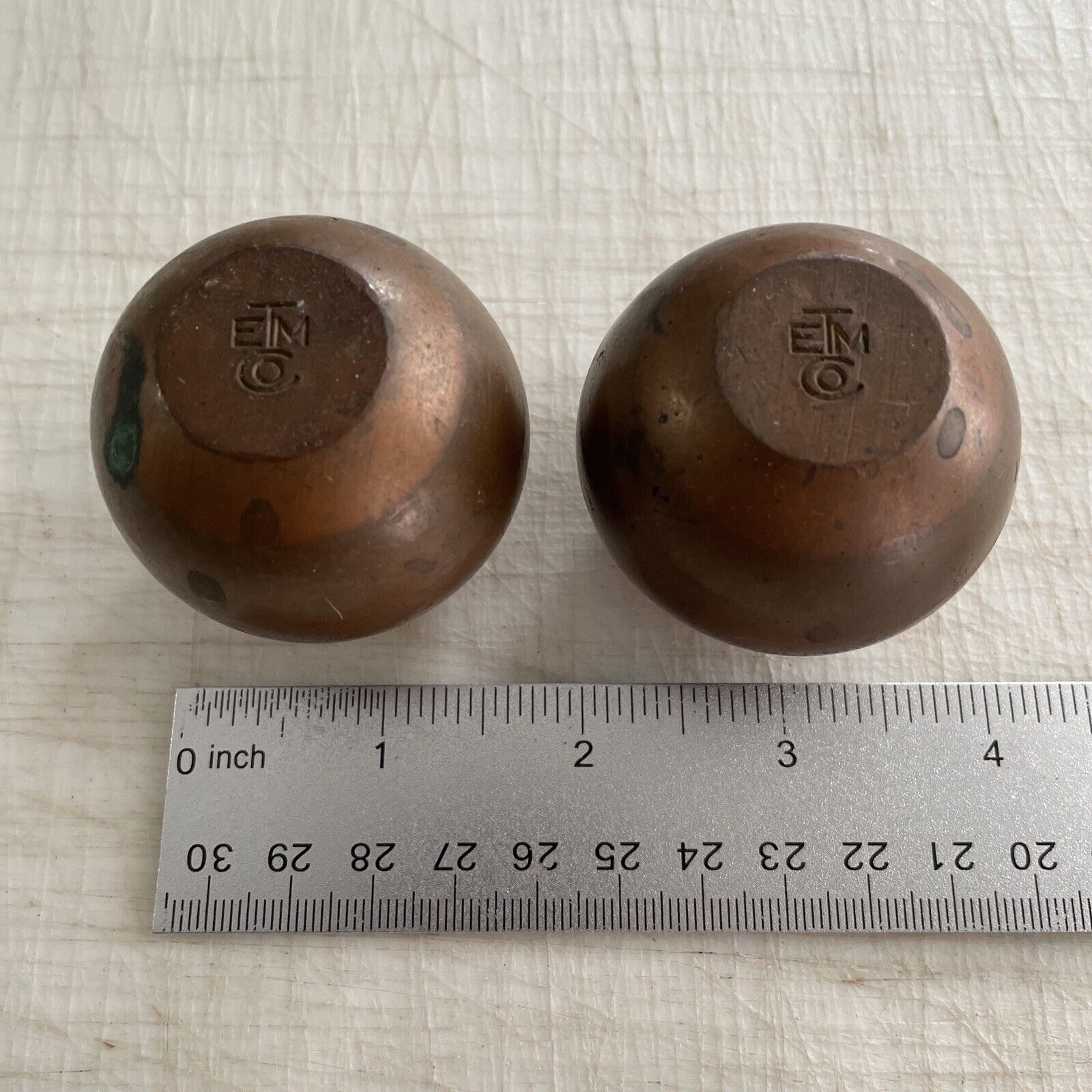 Pair of ETM Company Solid Brass Paperweights
