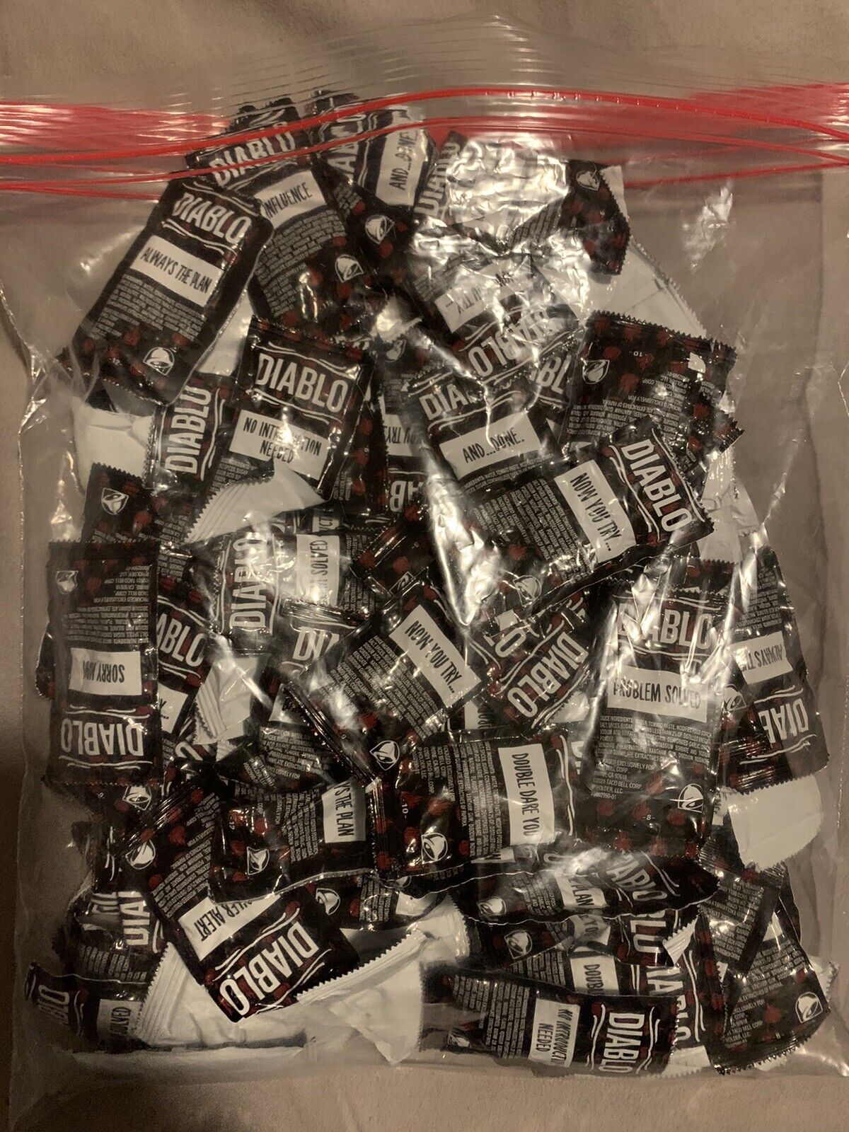 100 Taco Bell DIABLO  Sauce Packets.   New And Sealed Fresh