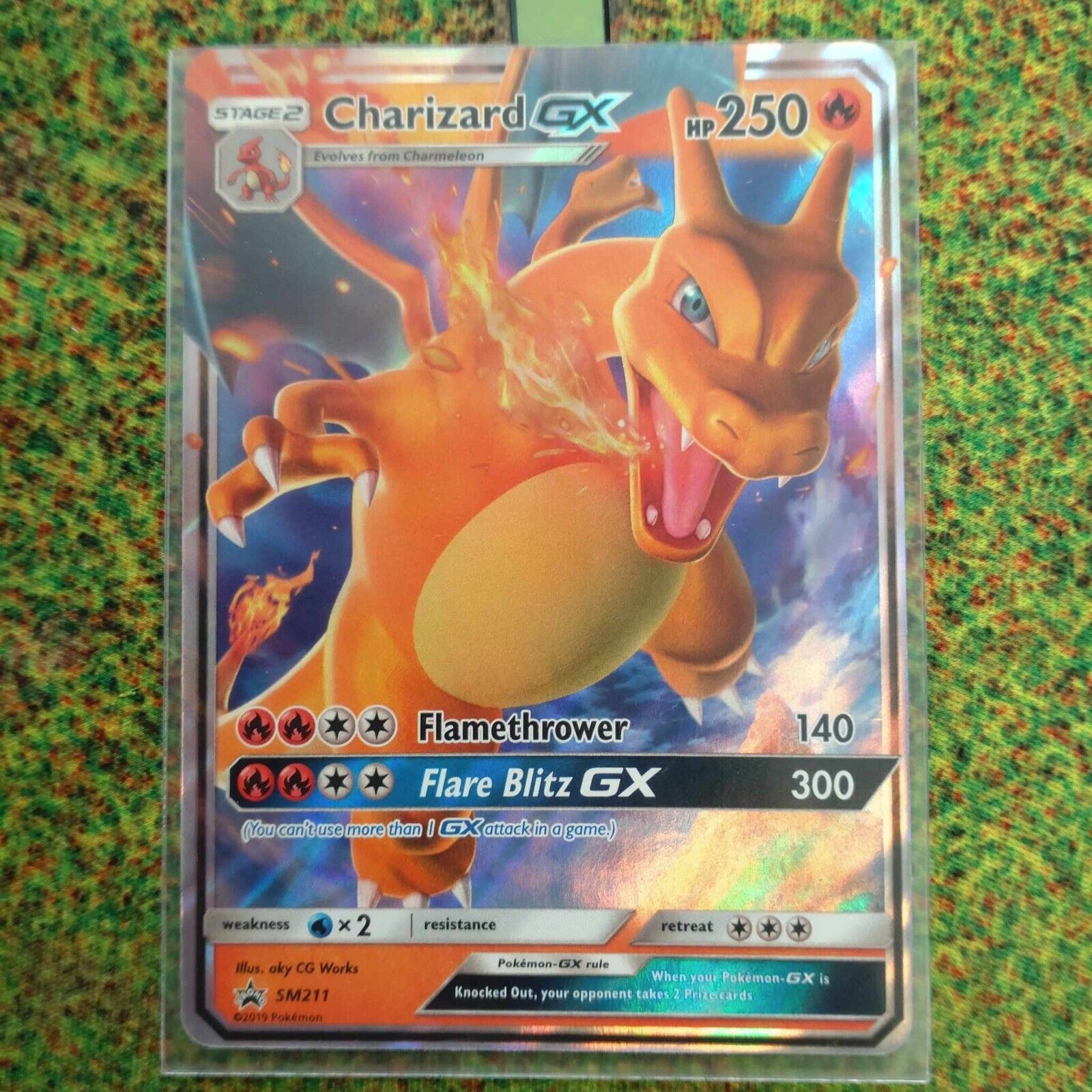 Pokémon Trading Cards Hidden Fates Charizard GX Mint / Near Mint Promo SM211 Tab