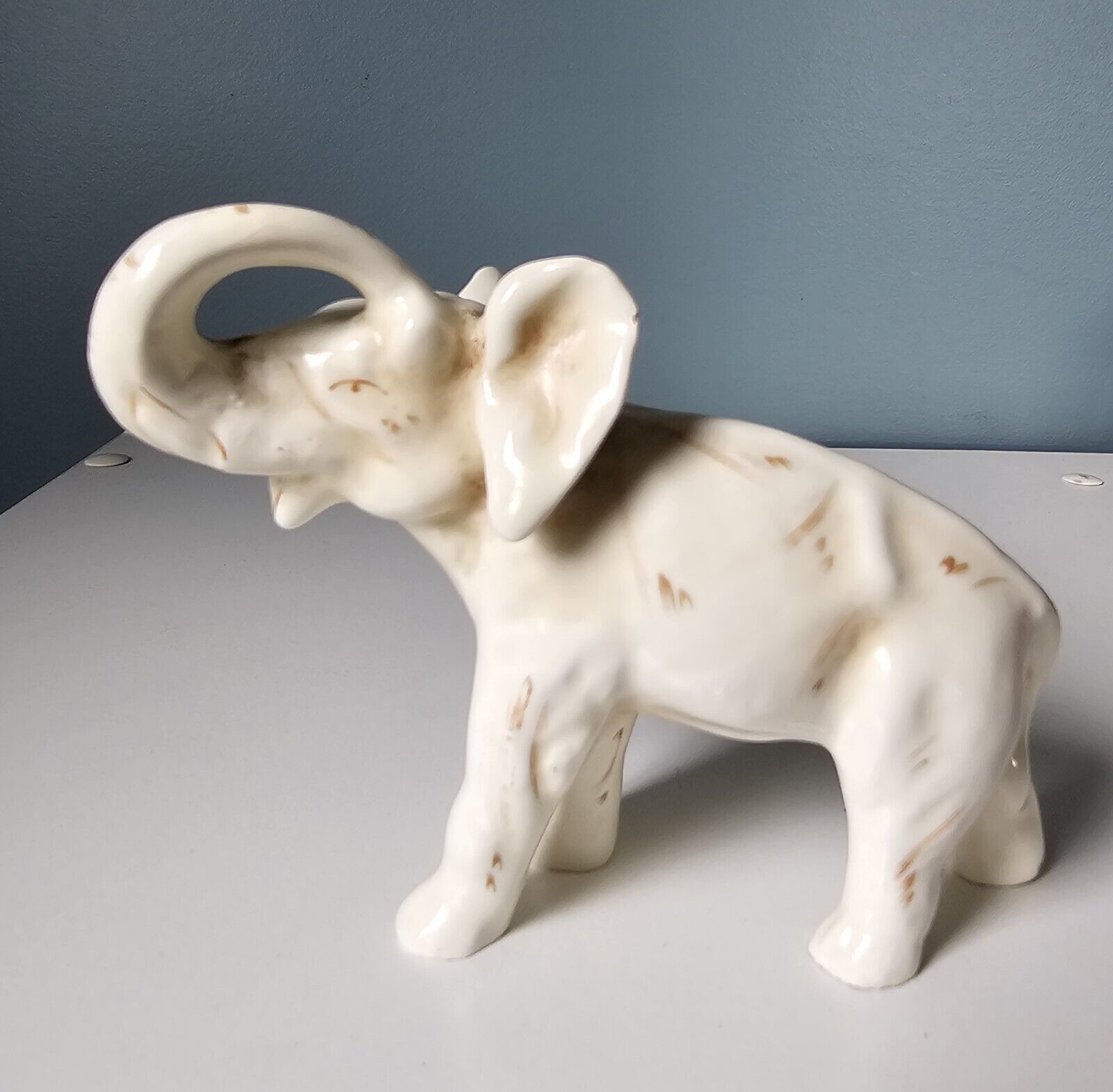Vintage Standing White Elephant Brown Painted Trunk Up Ceramic Figurine