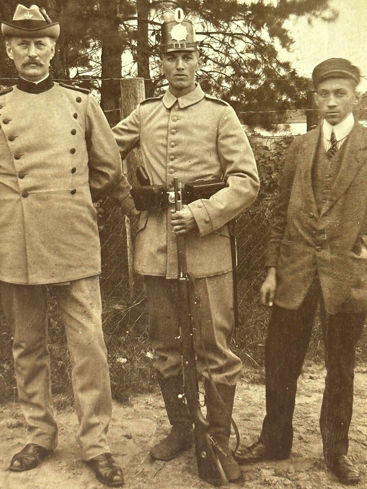 WWI Young German Soldier w Older Veteran & Teenager Group RPPC Postcard V*