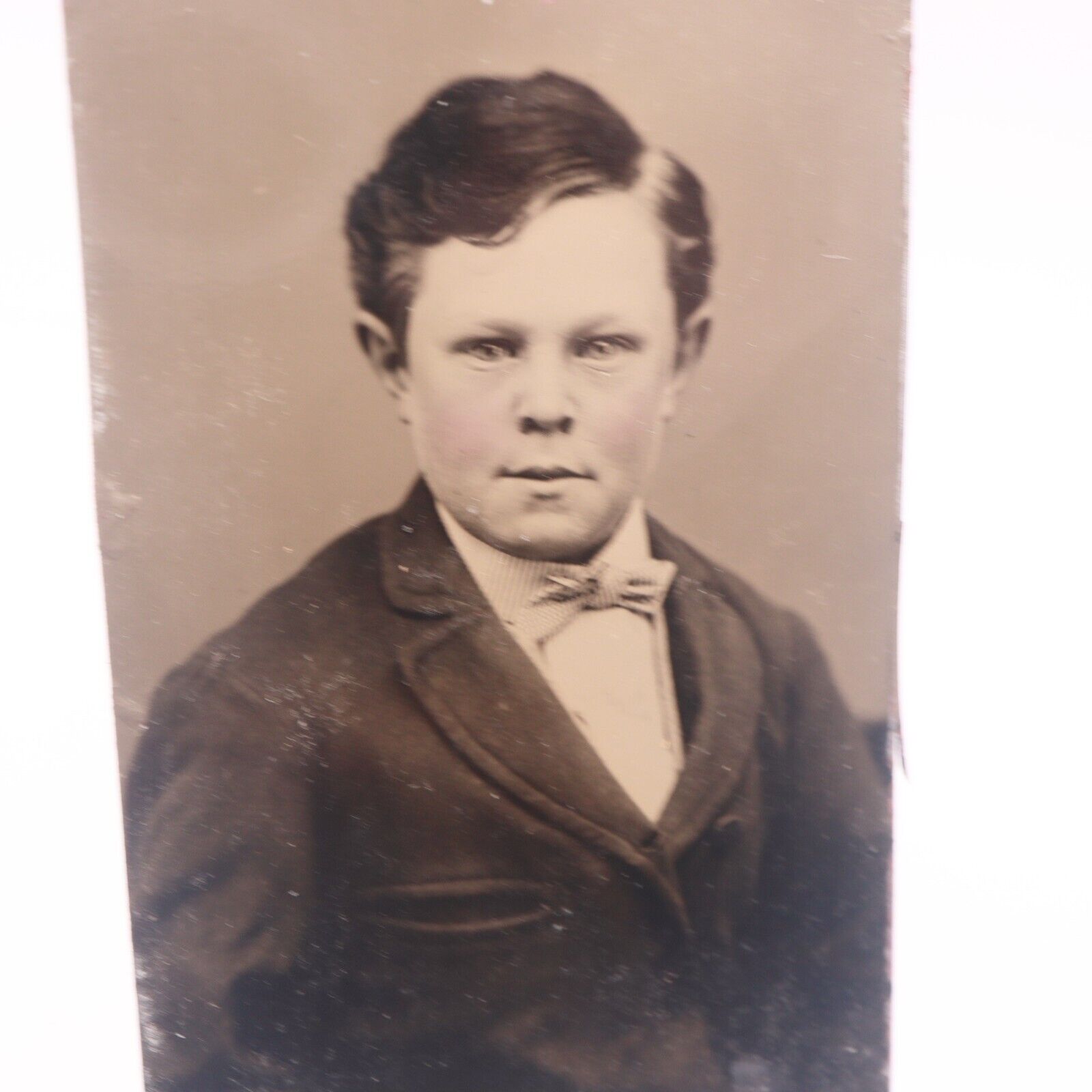 Antique Tintype Photo of Well Dressed Boy with Crazy Eyes