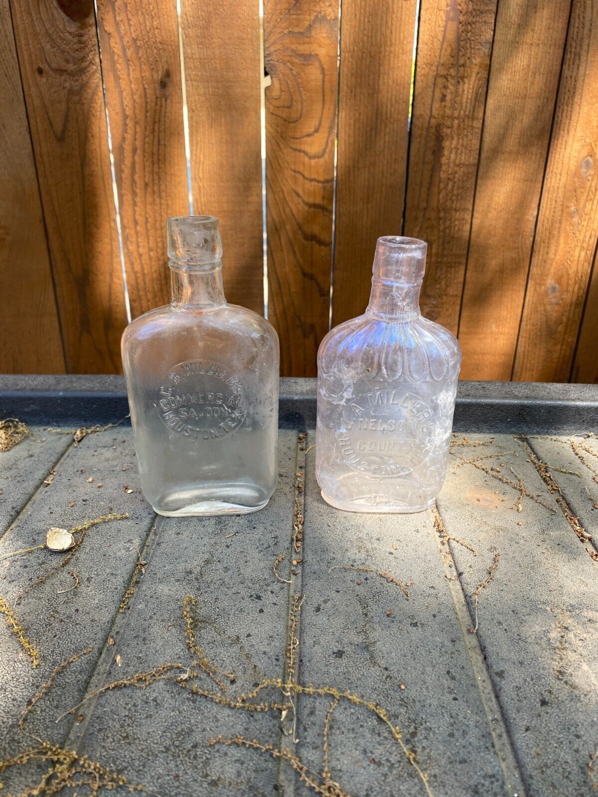 Two Texas Whiskey Flasks from Houston, one marked \