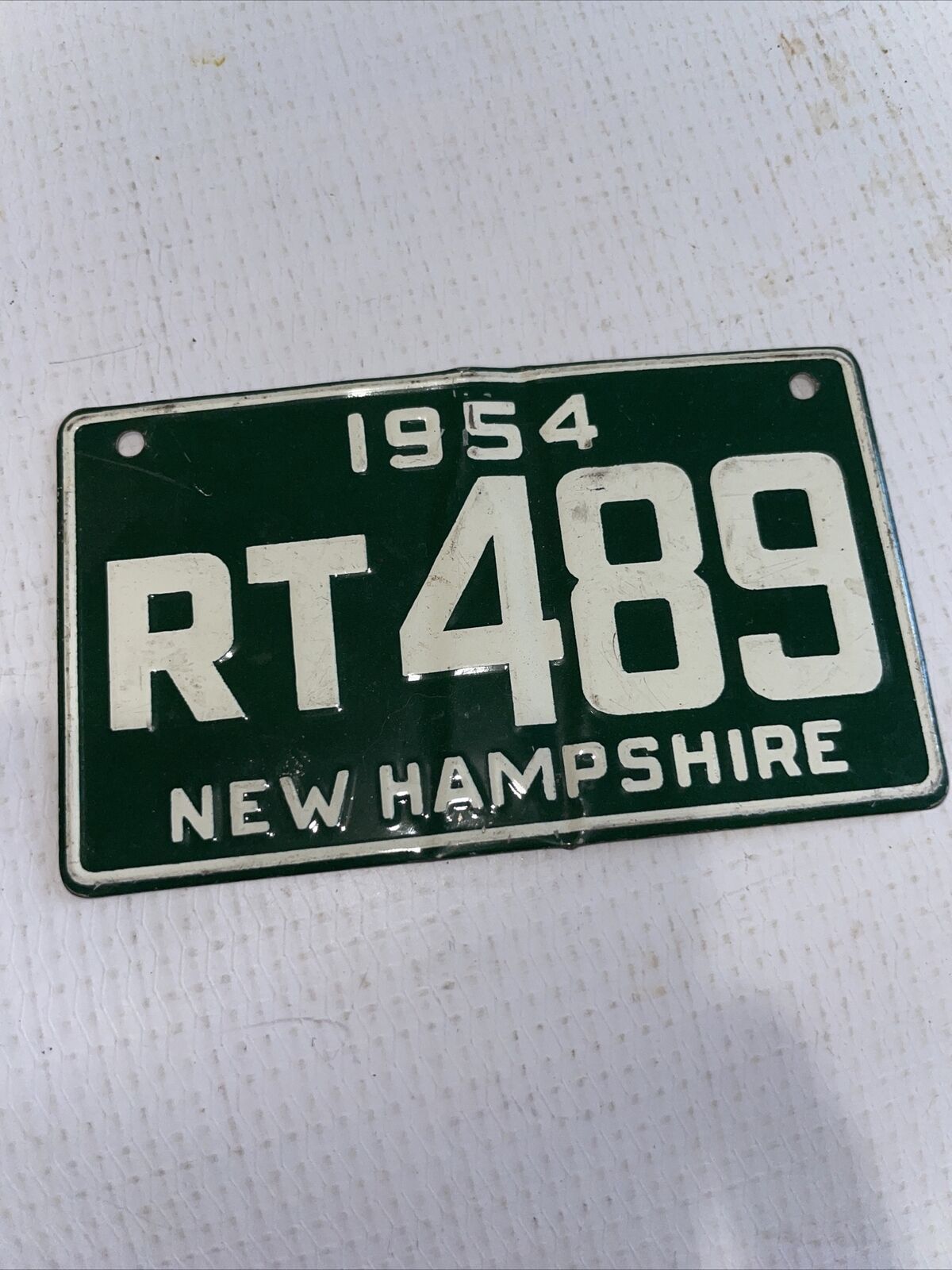 Vintage 1954 New Hampshire bicycle license plate green