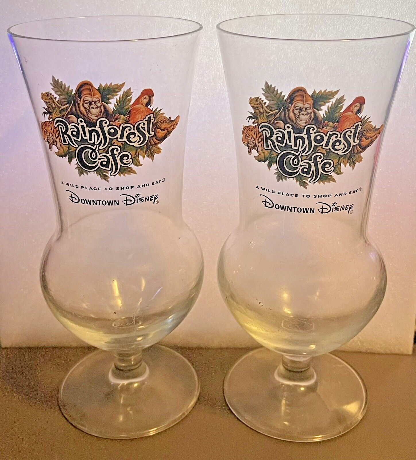 Set 2 Rainforest Cafe Downtown Disneyland Collectible Glassware Hurricane Glass