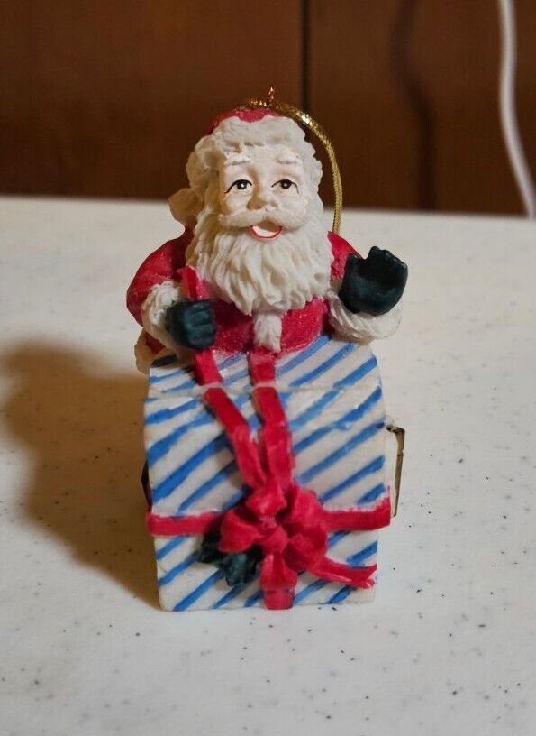 Santa Claus Holding Present Ornament
