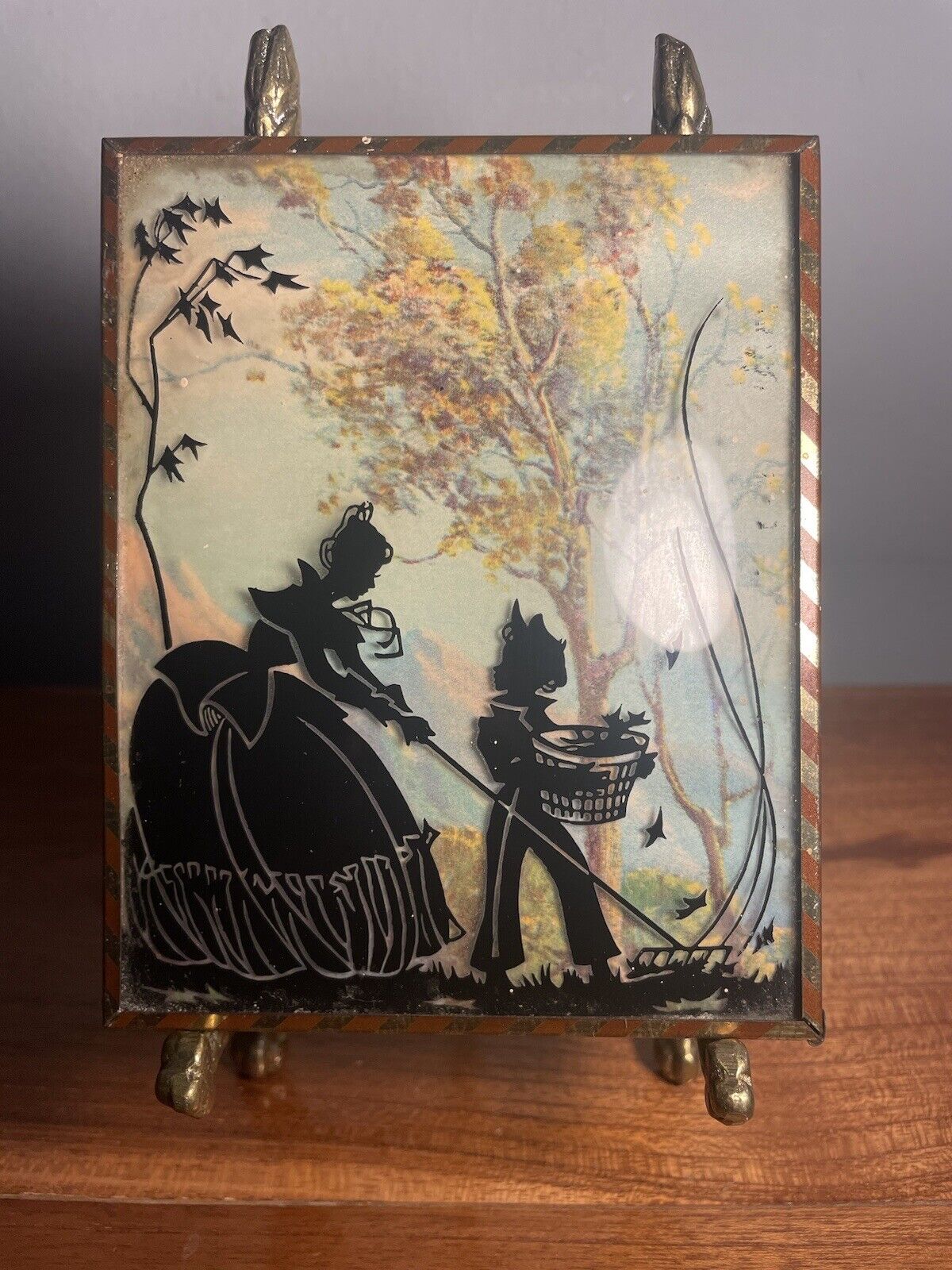 Vintage Framed Reverse Painted Silhouette On Convex - Woman Child Gather Leaves