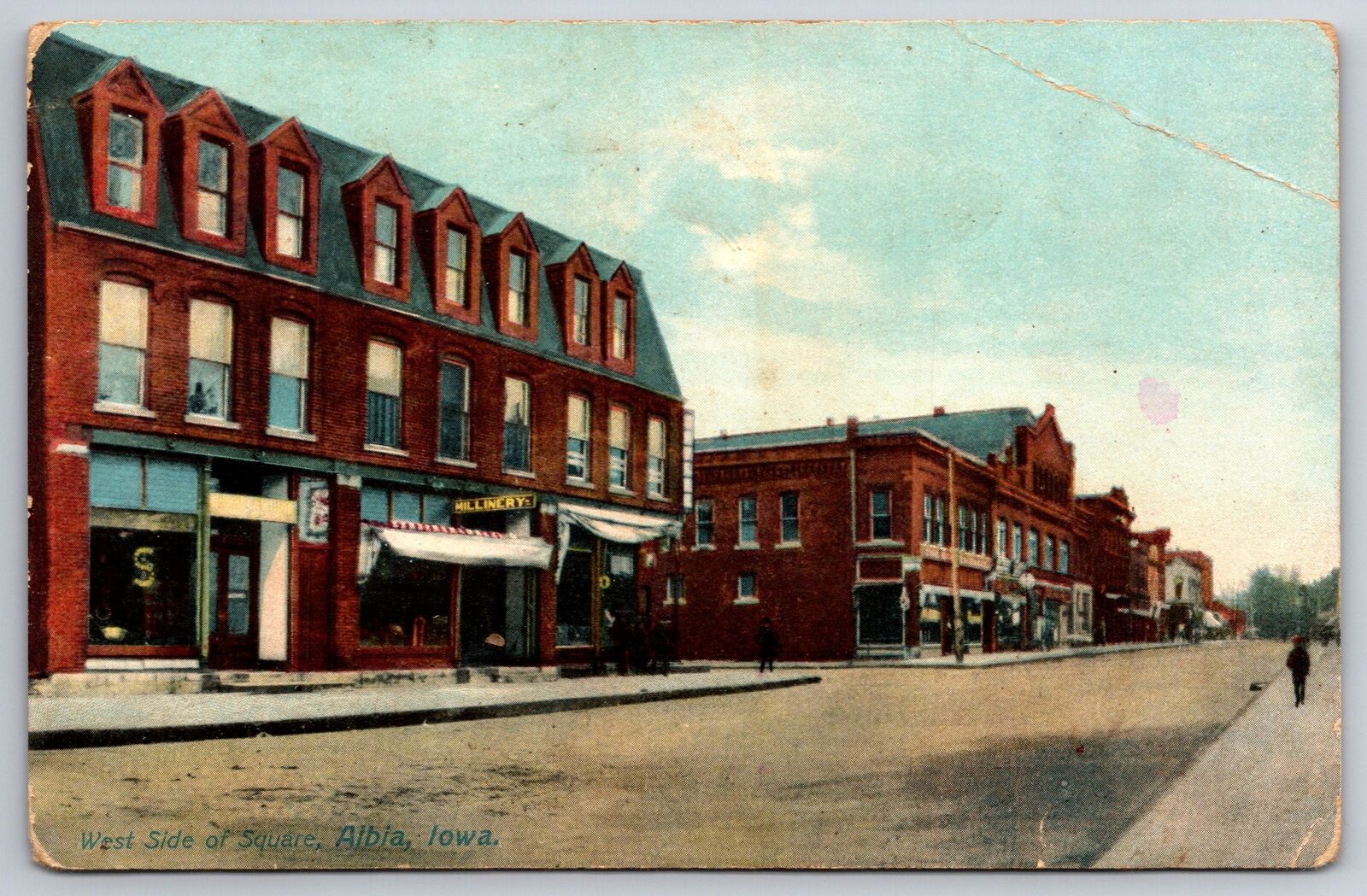 Albia Iowa~West Side of Square~Main Street~Millinery~c1910 Postcard