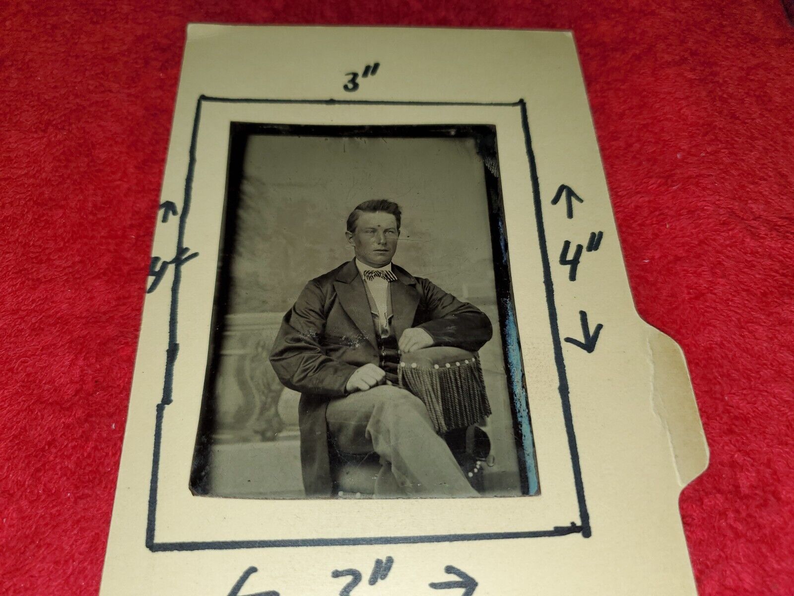 ANTIQUE LARGER TIN TYPE PHOTO OF YOUNG MAN IN CHAIR