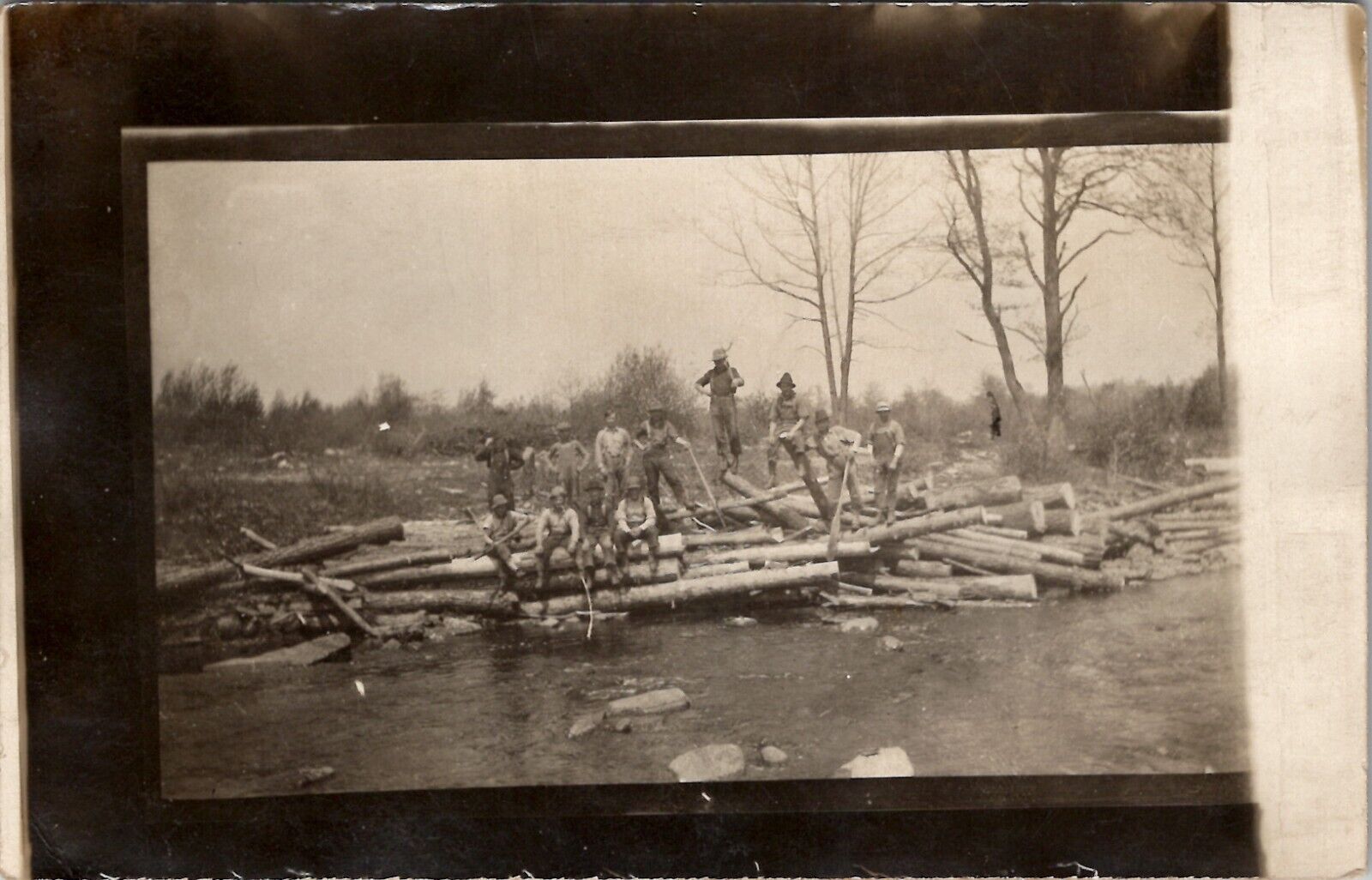 RPPC Lumberjacks Logging Loggers Crew on Logs Photo of Photo c1910 Postcard Z18