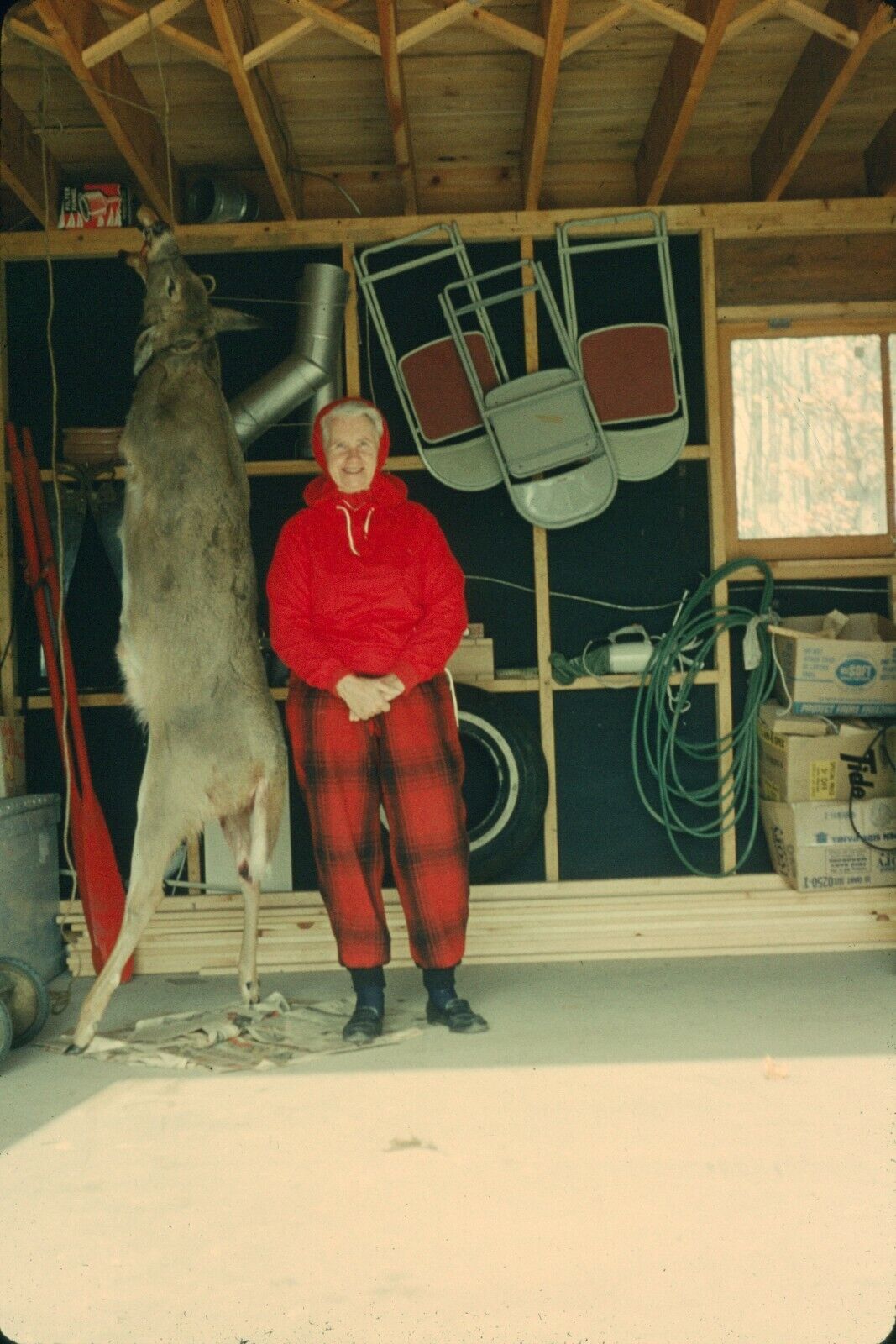 1965 Woman Smiling by Hunted Dead Deer Hanging in Garage Vintage 35mm Slide