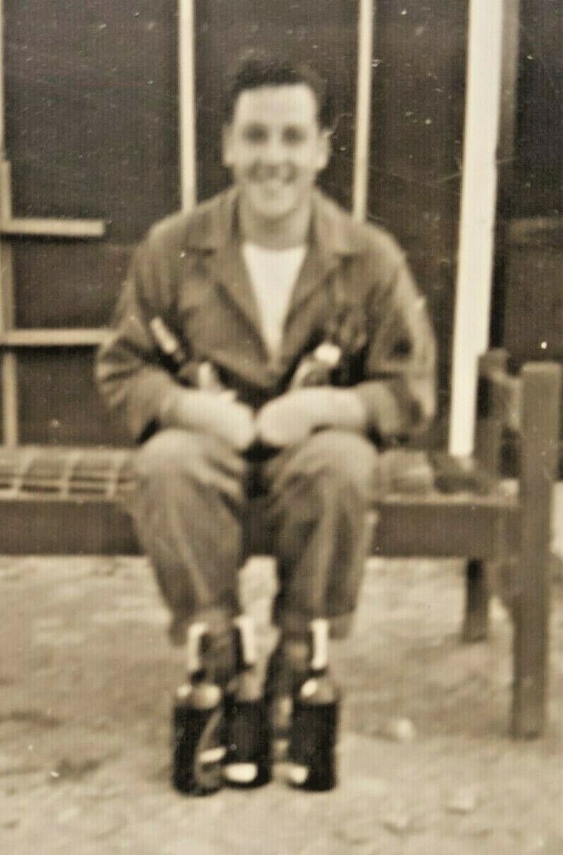 Vintage WWII Photo GI Airman Outside Australia Barracks with Alcohol Bottles