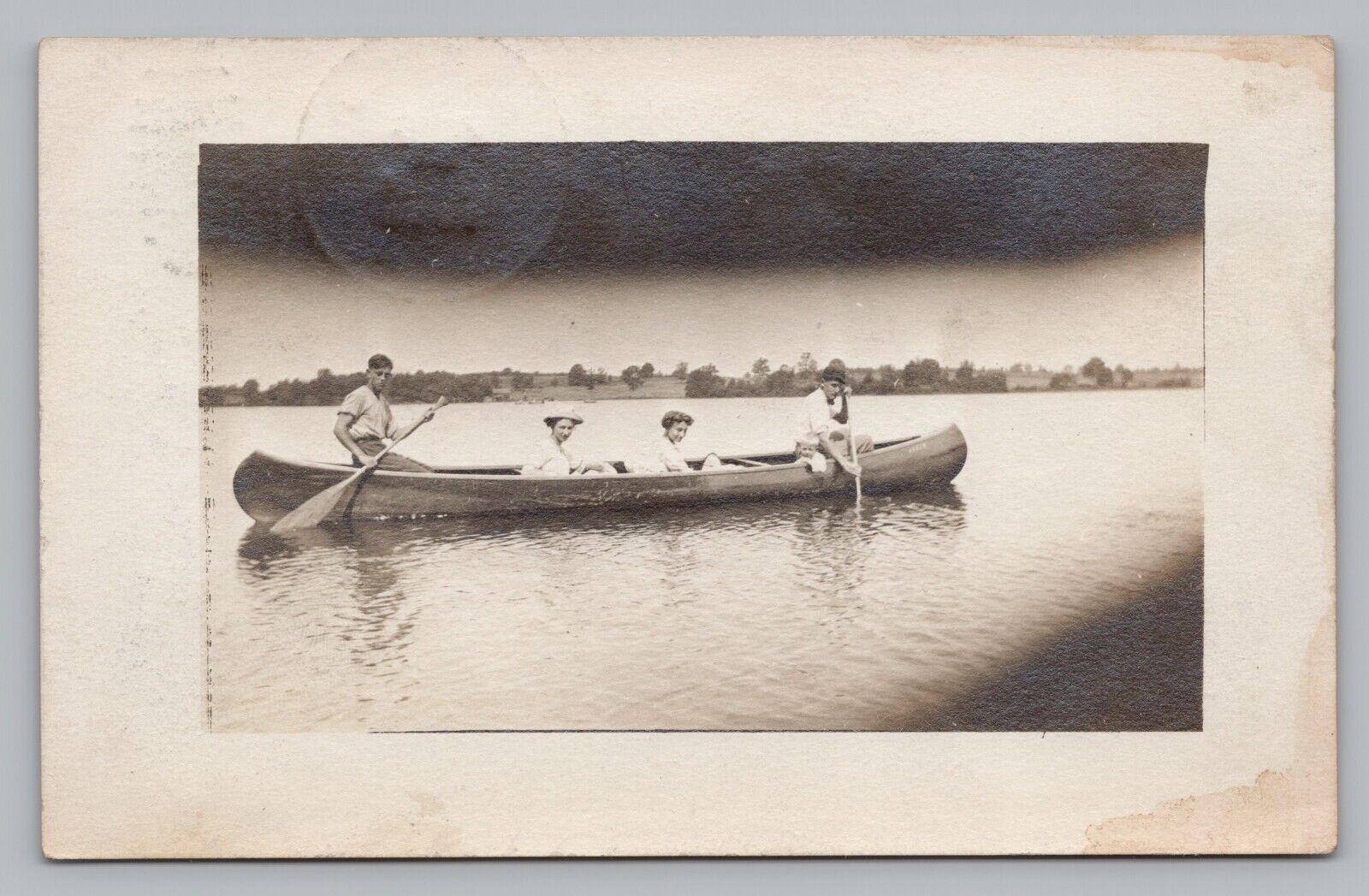 Men & Women in Canoe on Lake,  Michigan RPPC Early Photo Postcard c1911  P6