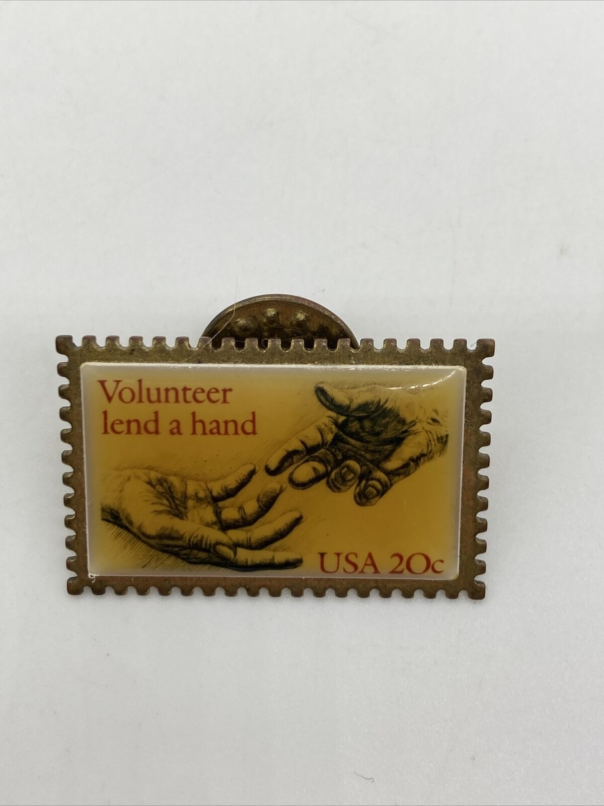 Nice VINTAGE Enamel USPS Stamp Lapel Pin Volunteer Lend a Hand USA 20 cents