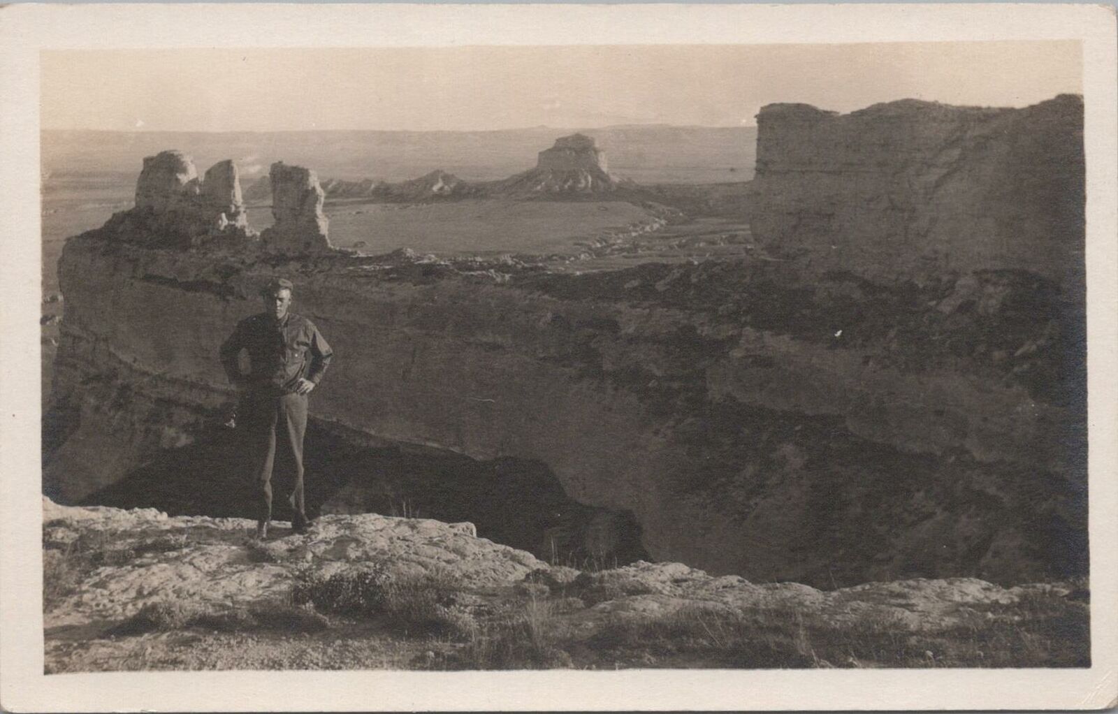 RPPC Postcard Man Posing in front of Canyons Southwest c. 1940s