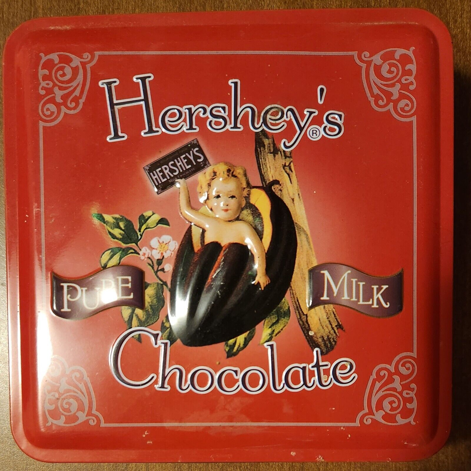 Vintage Hersey\'s Milk Chocolate Tin Baby Holding Hersey\'s Bar