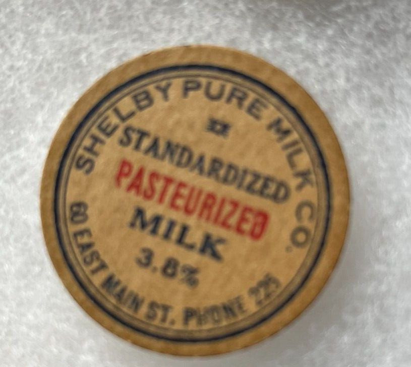 Shelby Pure Milk Co milk bottle cap,60East Main St Richland County Ohio Phone225