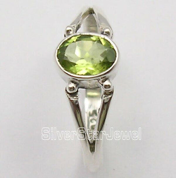 Ahoy: Peridot ring Size 5.75  Sterling Silver  1.9g  5 x 7 mm #2066