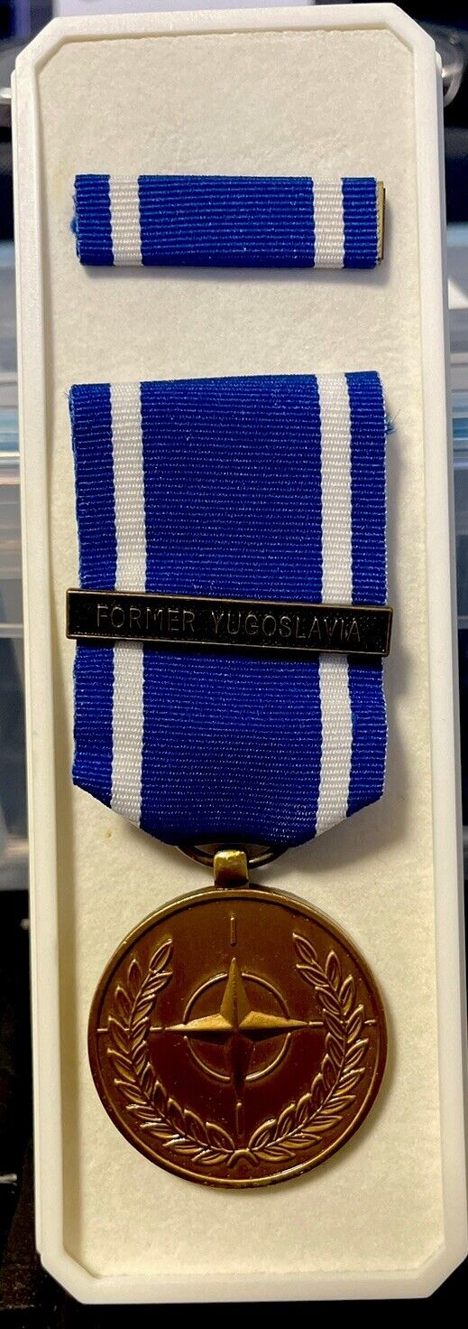 One NATO Kosovo Service Award medal with Kosovo bar and ribbon in NATO case