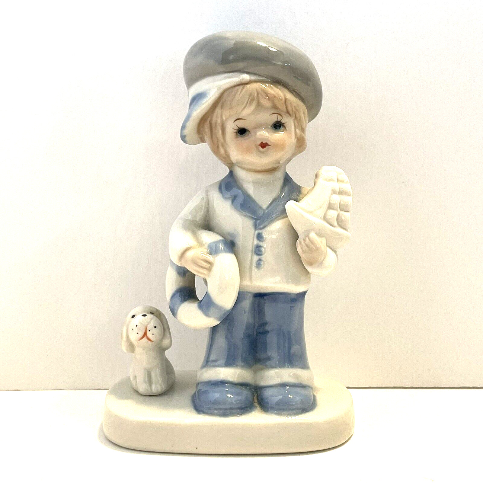 Vintage Enesco Hand Painted Boy With Sailboat & Dog Figurine Blue and White