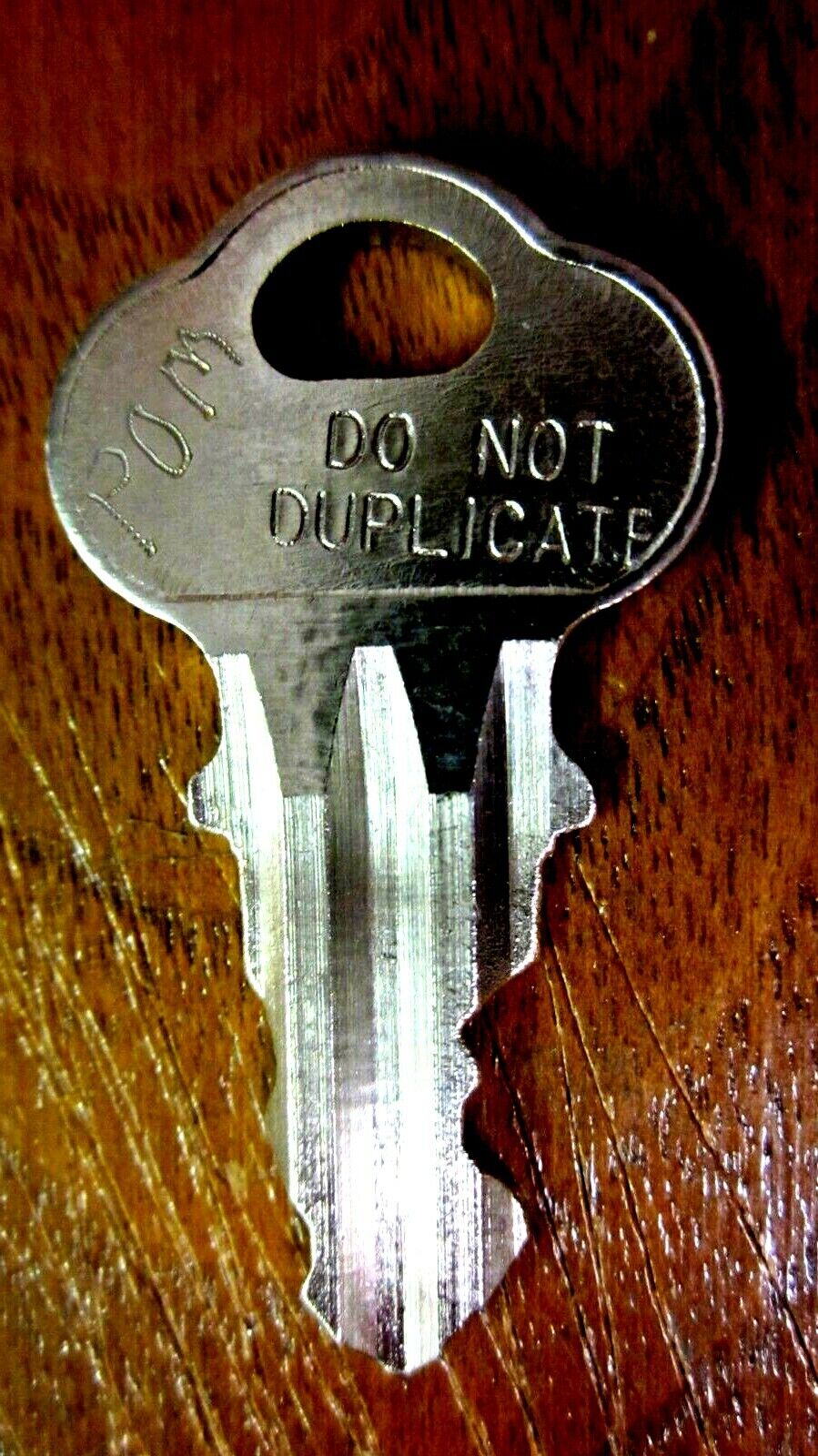 Top key for Parking meters with a lock that is stamped POM