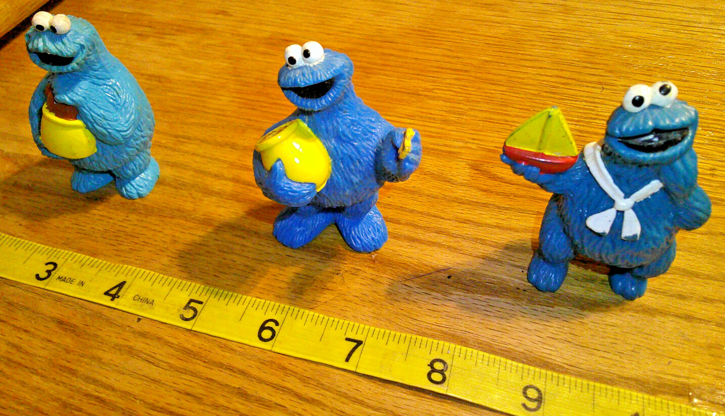 three Vintage Sesame Street Cookie Monster  Figures