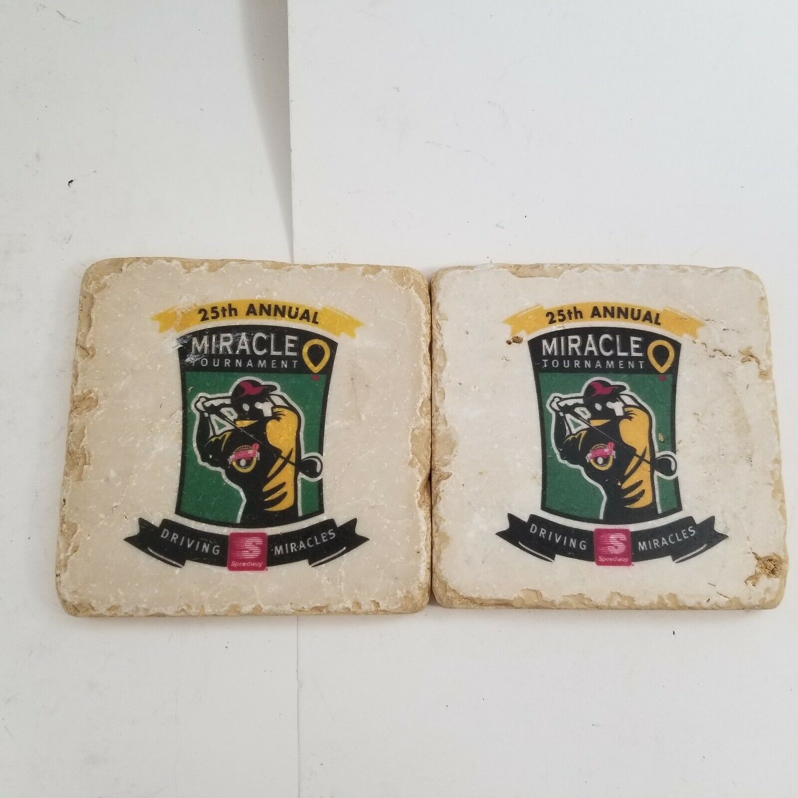 Set of 2 Miracle Golf Tournament Coasters 25th Annual Driving Miracles Speedway