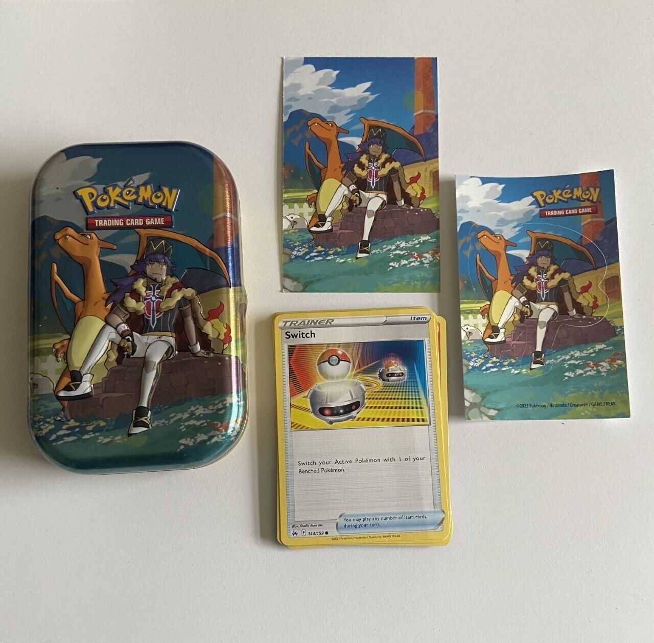Pokémon TCG: Crown Zenith Mini Tin – Leon & Charizard - OPENED