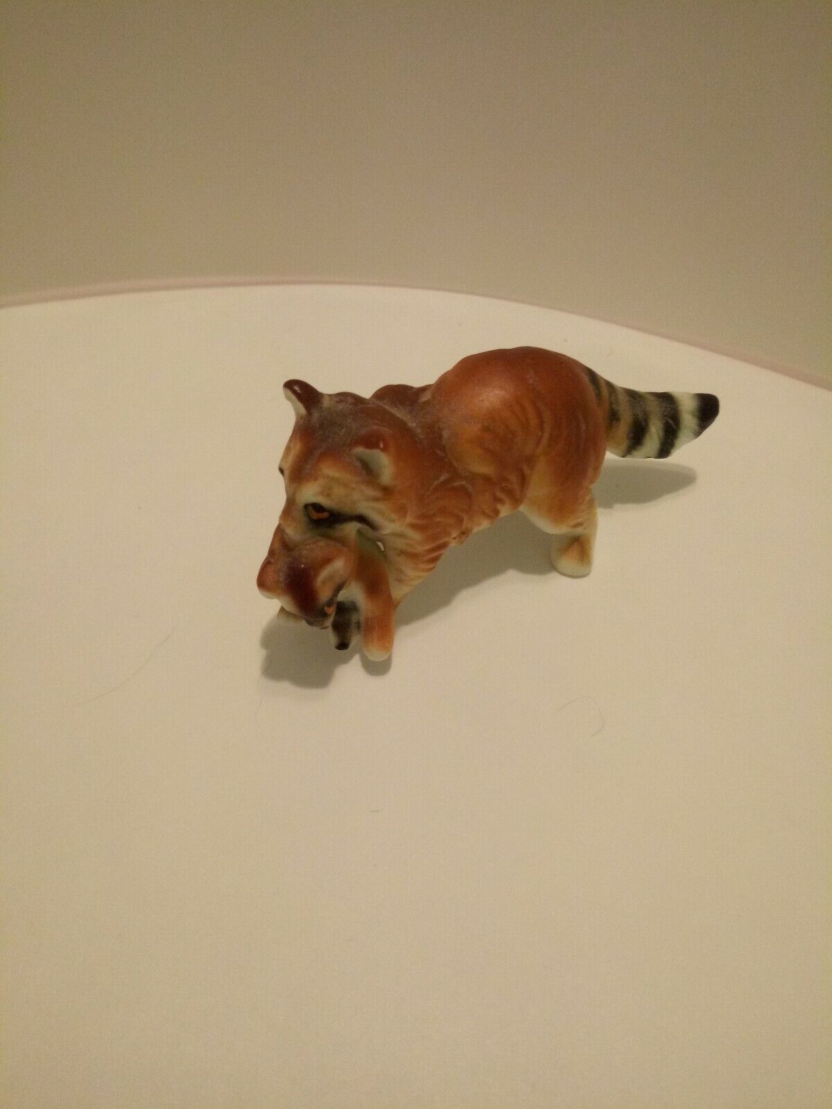 Vintage Ceramic Racoon carrying Baby