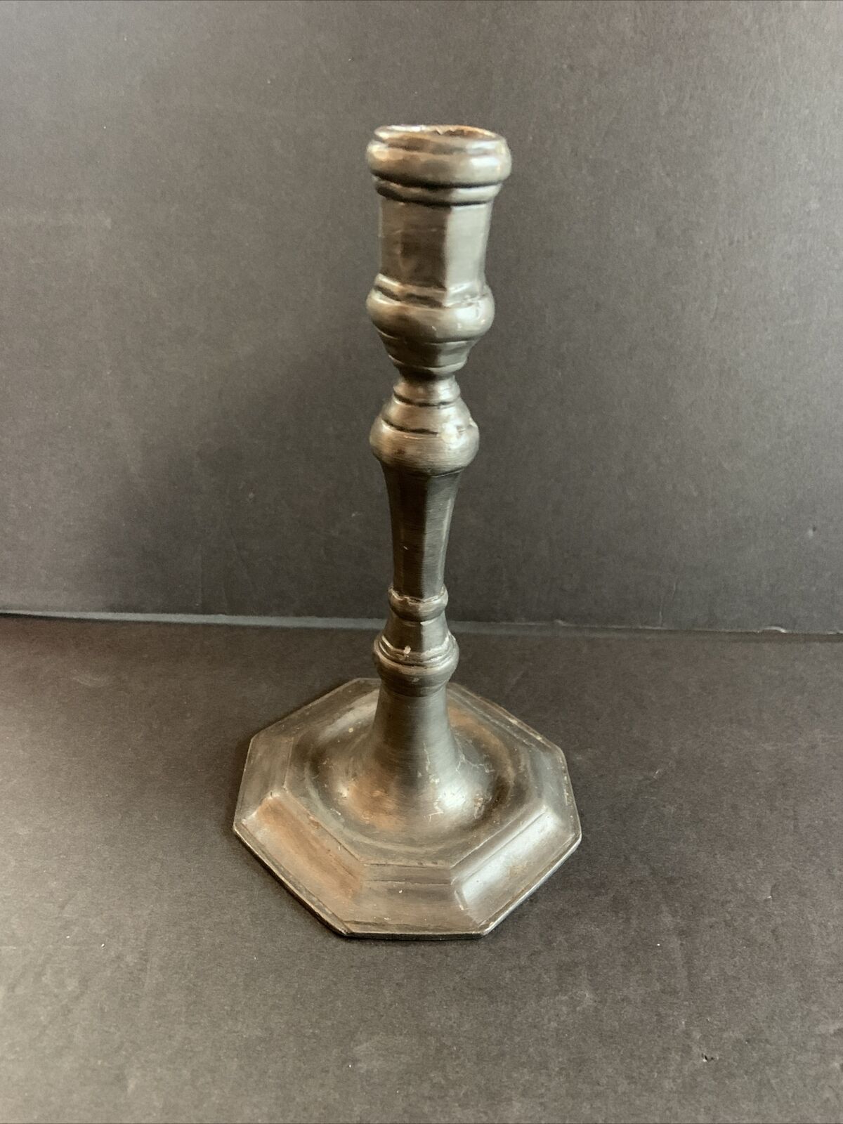 An Antique Early To Mid 18th Century Pewter Taper Candlestick, 7 1/2” Tall