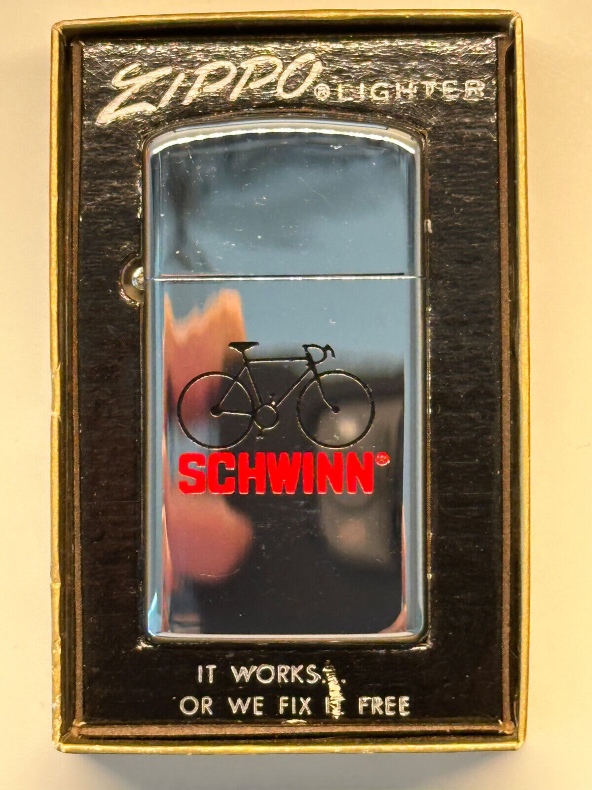 NOS SCHWINN BICYCLE CO. LIGHTER, MADE IN USA BY ZIPPO