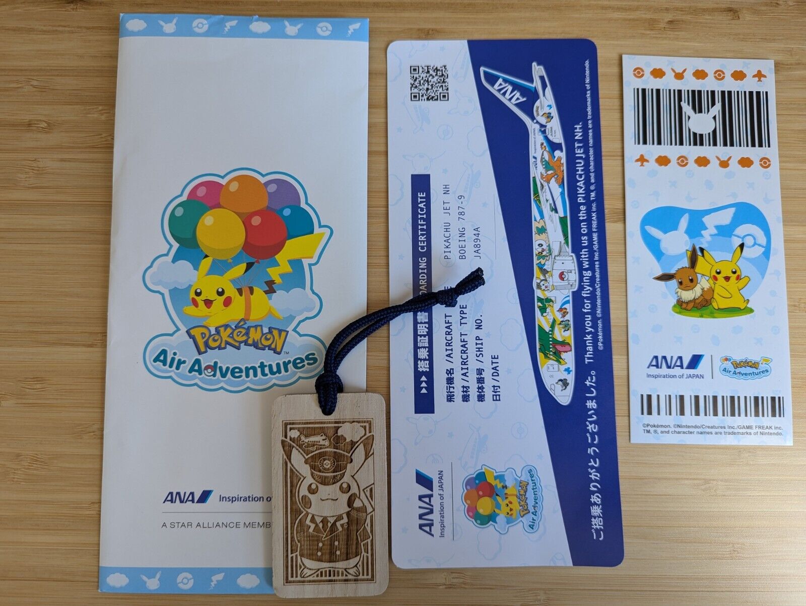 NEW All Nippon ANA Pikachu Pokemon Air Adventures Souvenirs Embossed Wooden Tag