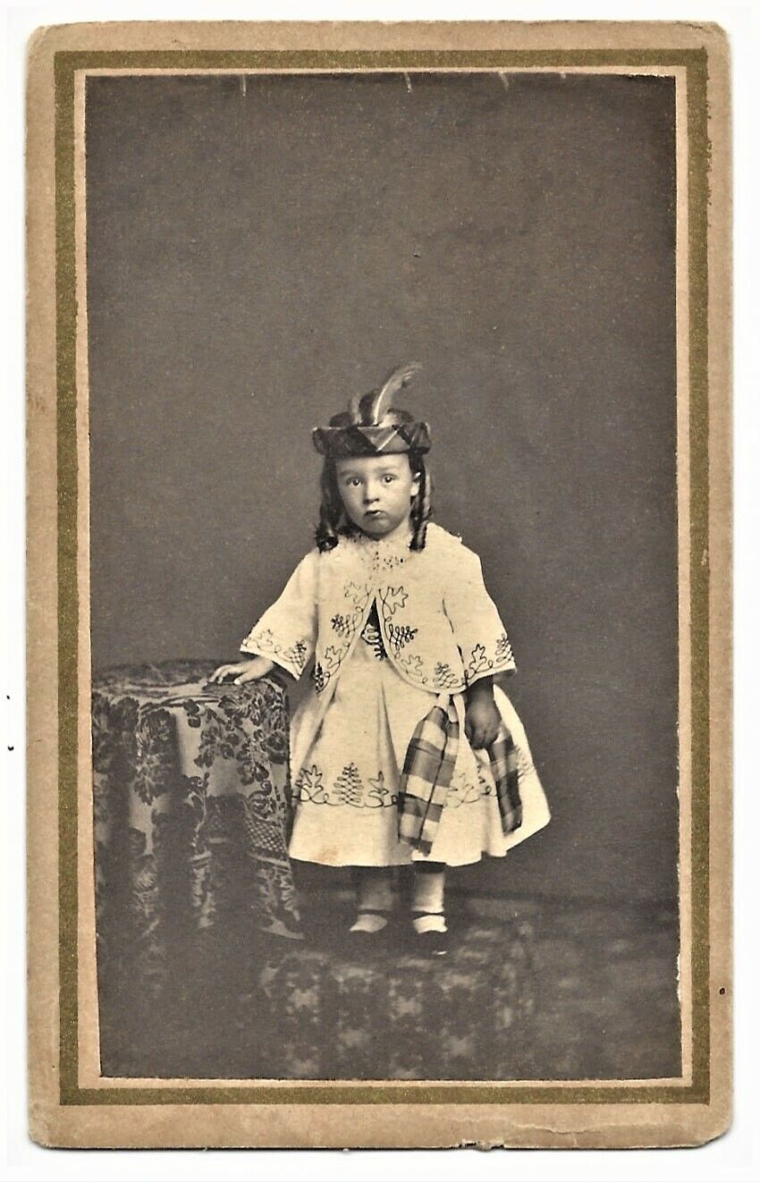 YOUNG GIRL WITH RINGLETS WEARING INTERESTING ATTIRE (EARLY CDV :1860’s)