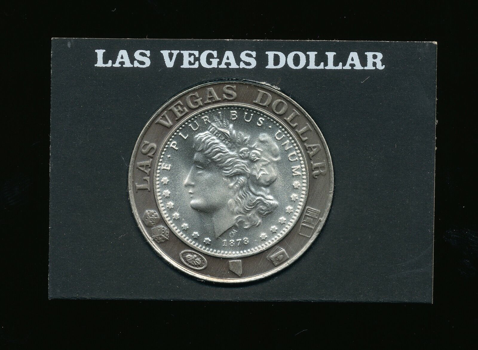 1878 Morgan Las Vegas Dollar Token, in original packaging                      q