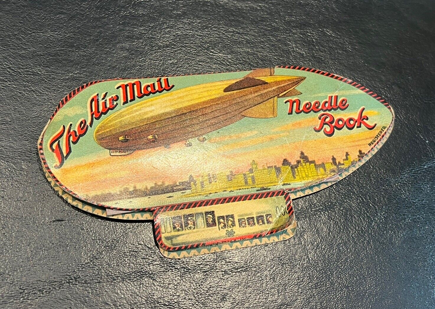 \'The Air Mail Needle Book\', package of needles in form of an airship,circa 1926
