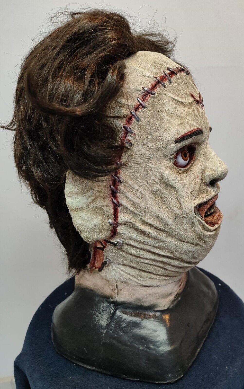 Leather Face Bust - Latex foam filled with hair and cristal eyes. Lifesize 1:1