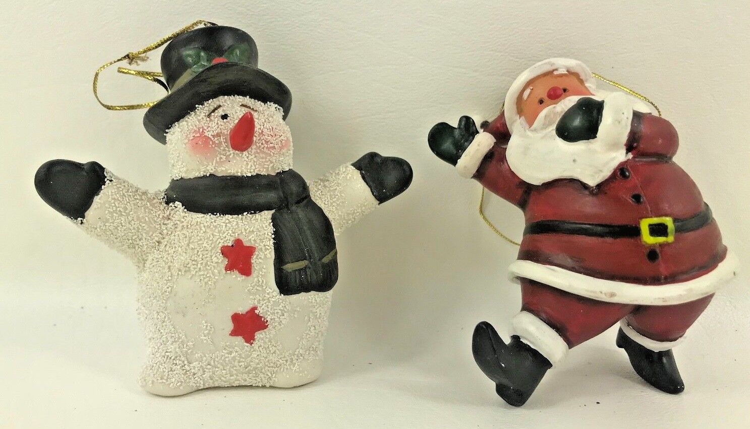 Pair of Holiday Christmas Resin Ornaments Snowman and Santa