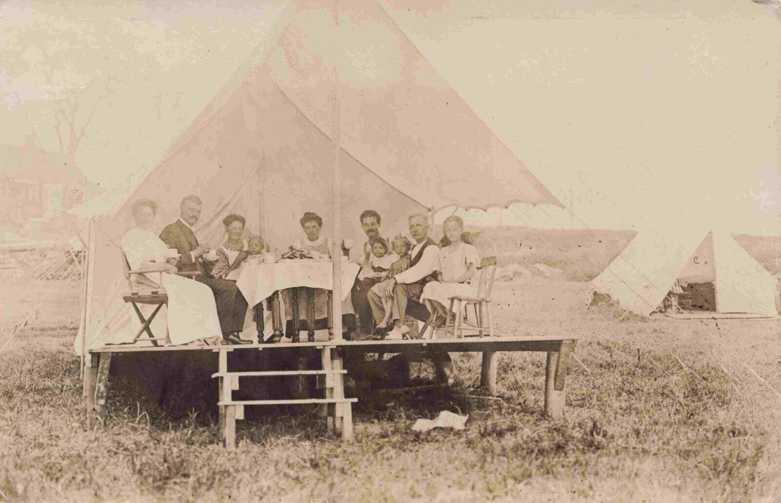 RPPC Family Eats in Raised Outdoor Tent Multiple Generations Real Photo Postcard