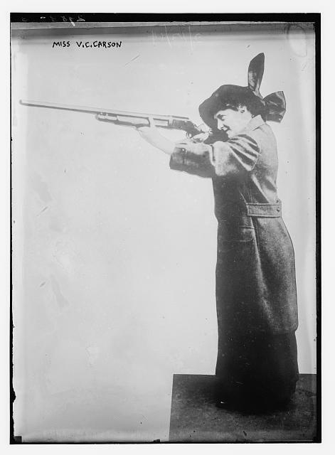 Miss V.C. Carson shooting a Winchester Model 1897 shotgun,February 13,1914