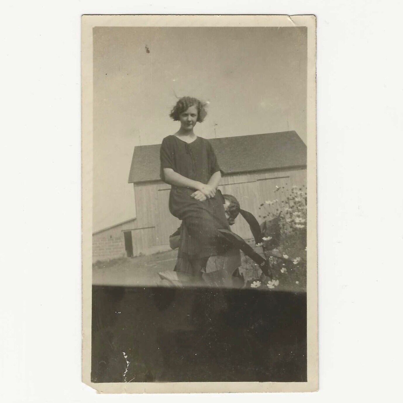Flapper Sitting On Hidden Woman’s Face Awkward Pose 1920s Snapshot Photo