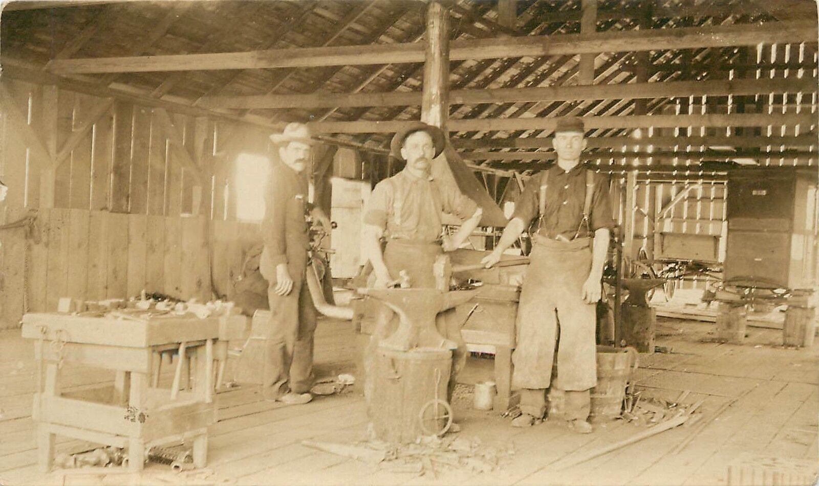 c1910 RPPC; Cloverdale OR Men in Blacksmith Shop Wheelwright Machines Industry