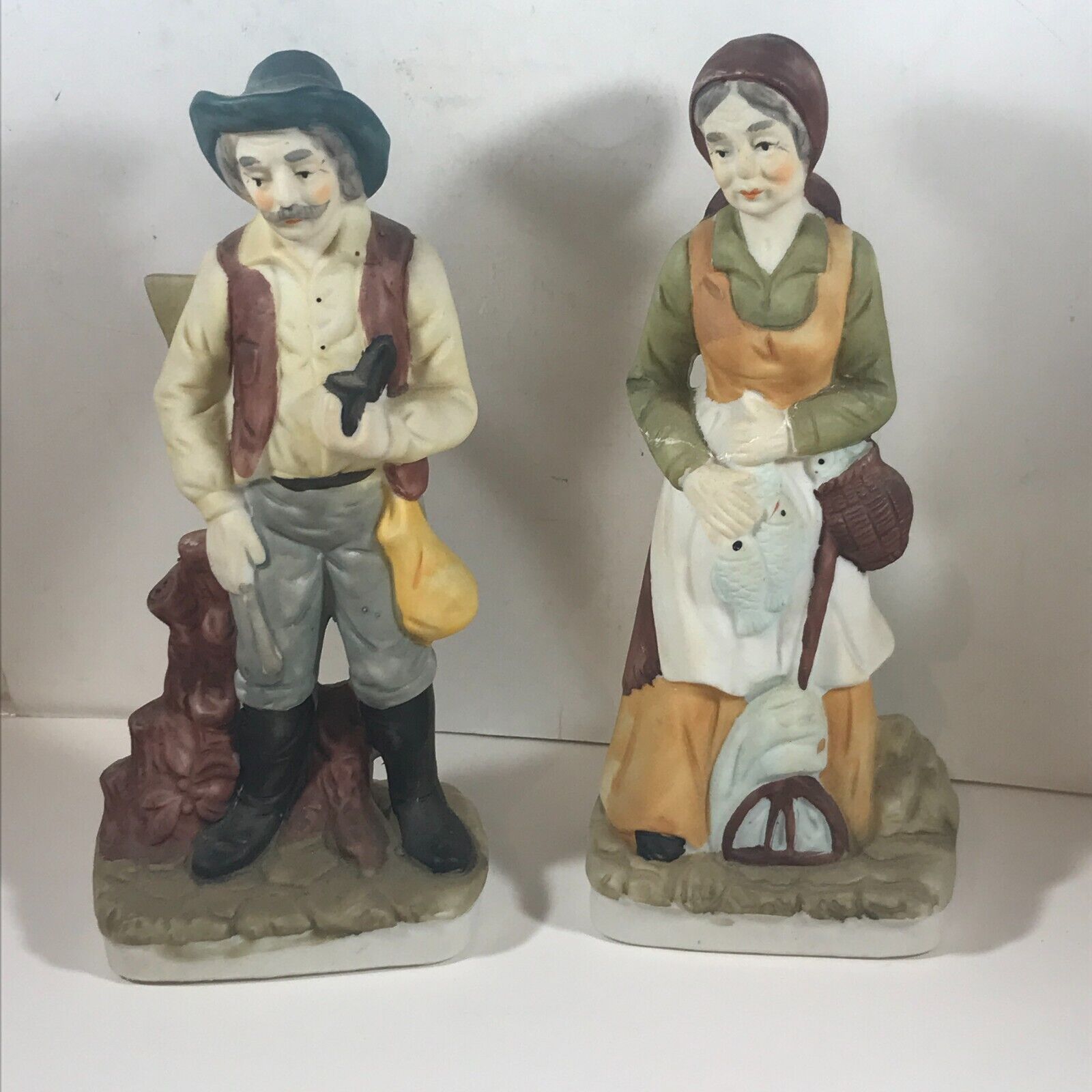 Pair of Vintage Porcelain Figurines Man Woman Hunter Fisher
